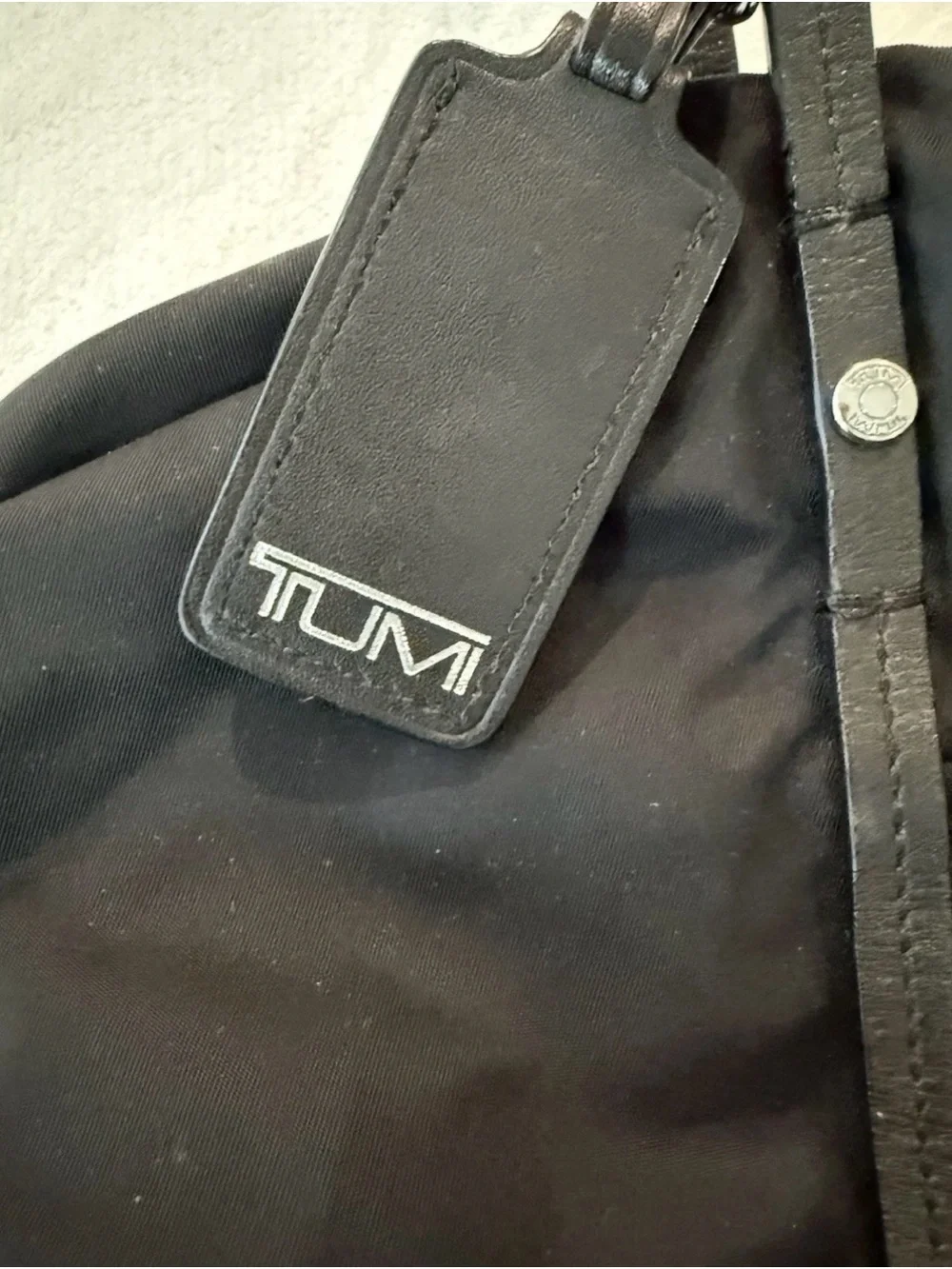 Tumi Voyageur Q-Tote Bag in black nylon with leather trim